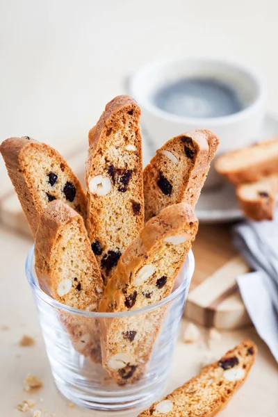 Italian cranberry almond biscotti  and cup of coffee on backgrou — Stock Photo, Image