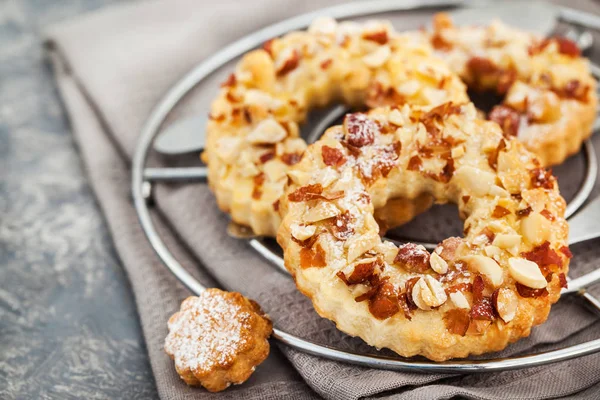 Ring shortbread cookies with peanuts on top — Stock Photo, Image