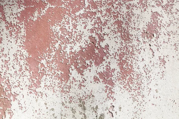 Alte grunzig verputzte Wand mit abblätternder Farbe — Stockfoto