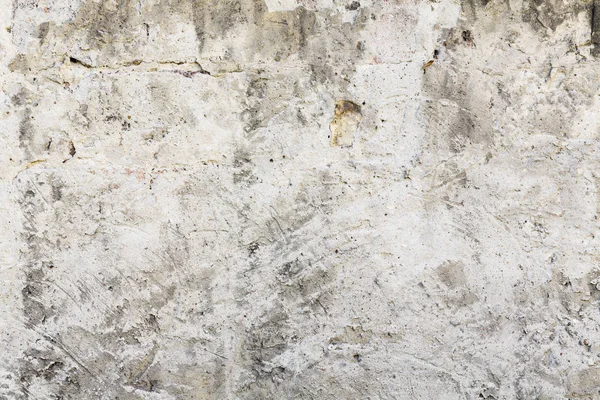 Gammel, grisete mur med avskallende farge – stockfoto