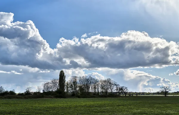 Panorama of a landscape with beautiful cloudscape — Stock Photo, Image