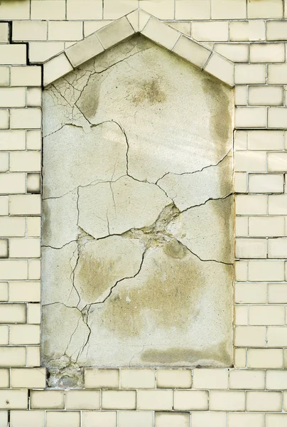 Frame in an old broken white brick wall — Stock Photo, Image