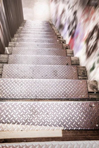 Old metal staircase downstairs — Stock Photo, Image