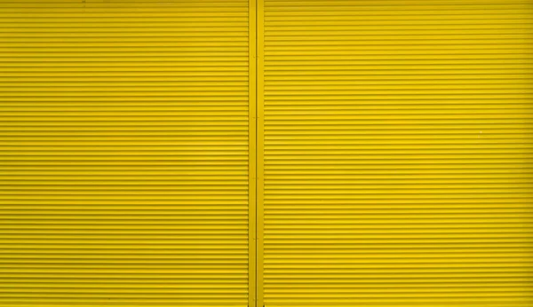 Yellow roller shutter for backgrounds and compositions — Stock Photo, Image