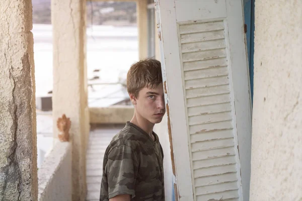 Portrait of a young man at a lost place — Stock Photo, Image