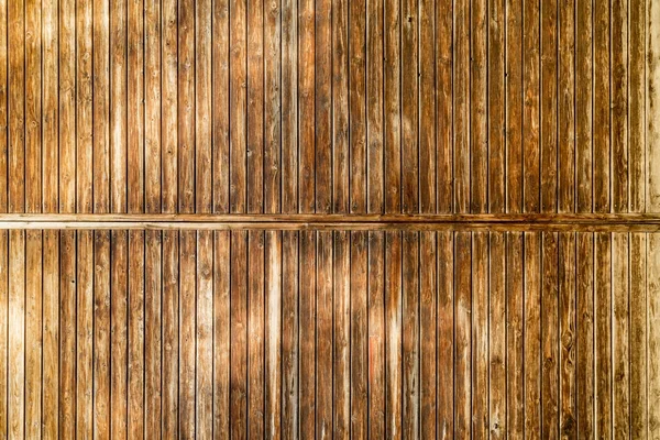 Gamla väderbitna trä vägg bakgrund — Stockfoto