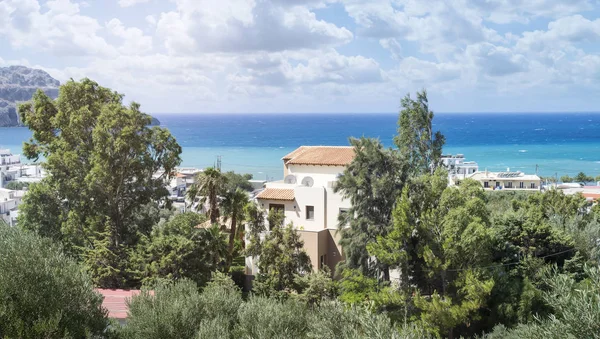 Greek landscape with villa and ocean — Stock Photo, Image