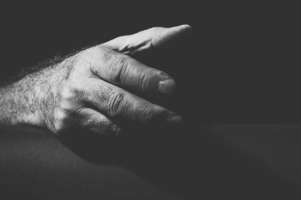 Close-up of a hand lying slightly open on the side — Stock Photo, Image