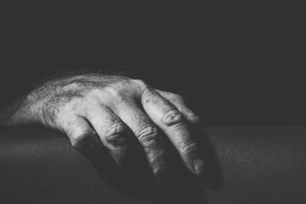 Black white recording of a relaxed hand — Stock Photo, Image