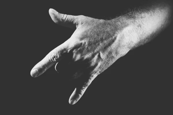 Hand showing a cool gesture, in black and white — Stock Photo, Image