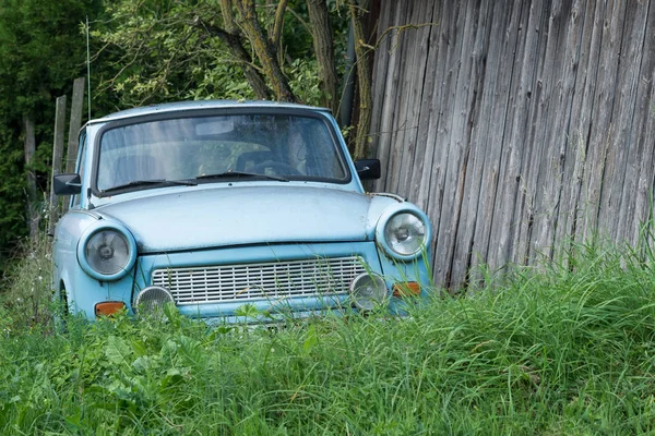 Old Eastern Europe GDR car is in the green meadow — Stock Photo, Image