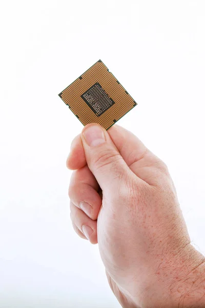 Uma mão com a CPU — Fotografia de Stock