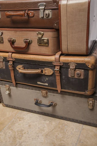 Old, retro, suitcases lie on the table with white background — Stock Photo, Image