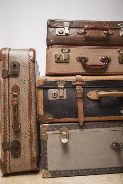 Old, retro, suitcases lie on the table with white background — ストック写真