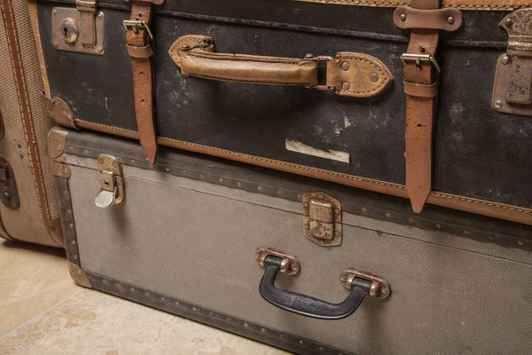 Old, retro, suitcases lie on the table with white background — Stock Photo, Image