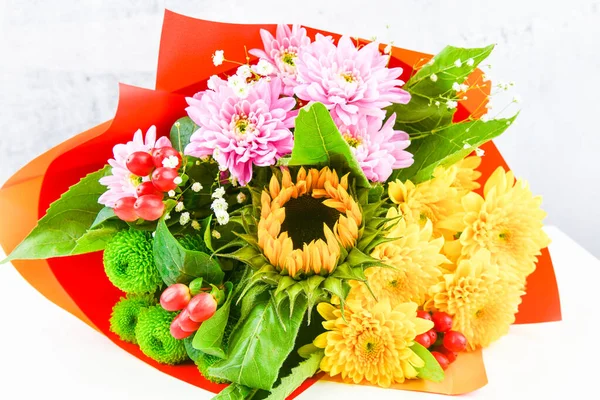 Bouquet of flowers on a white background. Flower of a sunflower. Place for an inscription. Easy cut. View from above. close-up. — Stock Photo, Image