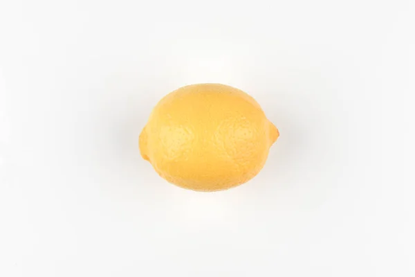 Lemon on a white background. Fresh juicy lemon on a white background. View from above. A place to write. In isolation. Cut out the background. — Stock Photo, Image