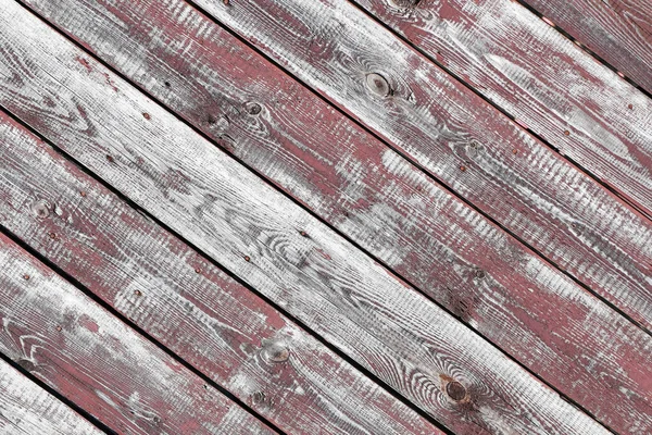 Latar belakang kayu merah-abu-abu. Papan horizontal. Kulit cat tua. Papan tua. Tekstur kayu abu-abu merah dari papan cat usang. Tekstur kayu abu-abu merah dari papan yang sudah usang — Stok Foto