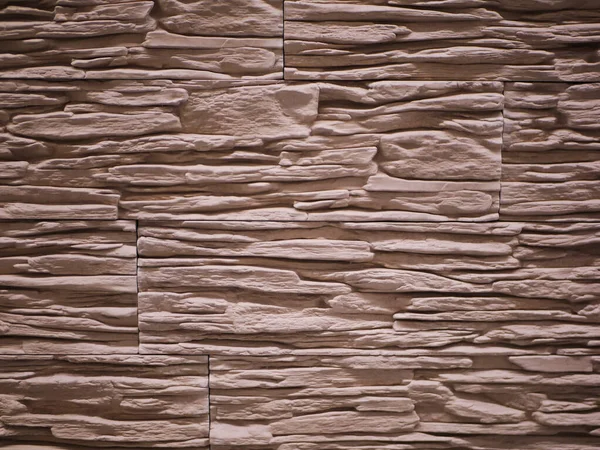 Fachada de pedra desigual close-up. Textura de pedra rasgada. Parede de pedra. Stonewall fundo abstrato — Fotografia de Stock