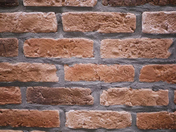 orange brick facade. Torn stone texture. Stone wall. abstract background