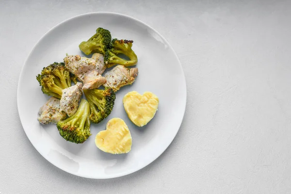 meat and broccoli salad. baked broccoli. Broccoli with fried bacon and walnuts in vintage style