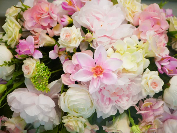 Bouquet of roses close-up. A bouquet of beautiful wedding flowers, pink roses.