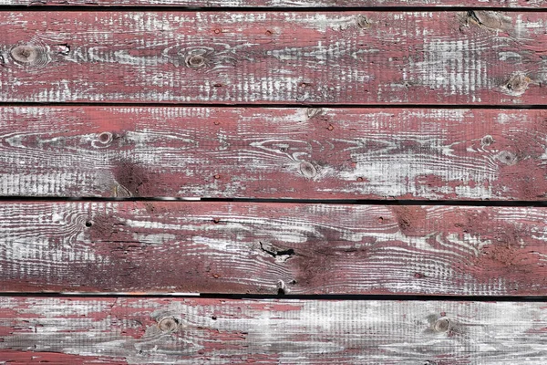 Latar belakang kayu merah-abu-abu. Papan horizontal. Kulit cat tua. Papan tua. Tekstur kayu abu-abu merah dari papan cat usang. Tekstur kayu abu-abu merah dari papan yang sudah usang — Stok Foto