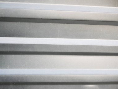 Metal çitlere yakın çekim. Gri tırtıklı. Yazı için uygun bir yer. Proje için arkaplan.