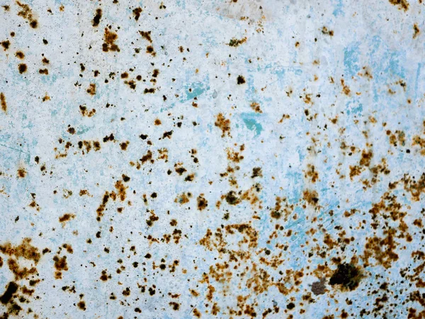 Rust points on a blue background. blue wall texture deteriorated with rust points. Texture of painted grey metal with corrosion points. — Stock Photo, Image