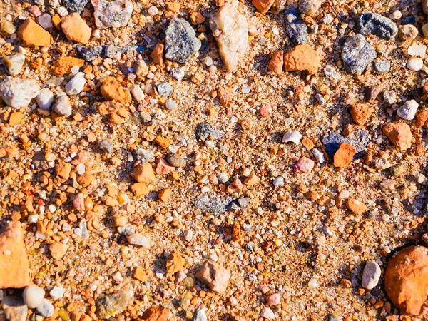 Piedras anaranjadas. en el sol de cerca. Textura para el fondo . —  Fotos de Stock