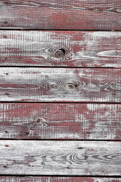Red-gray wooden background. horizontal boards. old paint peels off. old boards. Red gray wood texture of a worn painted board. Red gray wood texture of old worn painted board — Stock Photo, Image