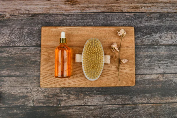 Skin care products. Anti-cellulite massage brushes. view from above. Massage brush. On a pink background. Accessories for massage. Flatley. eco care concept. Skin care products on white.