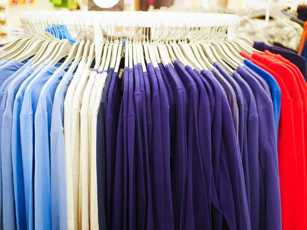 Womens underwear is hanging on store hangers. Womens bras for sale