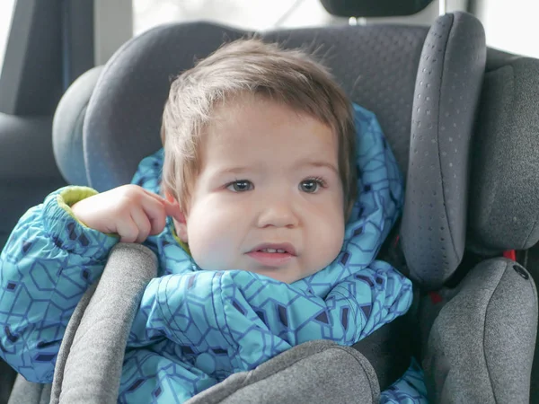 Child in a car seat. Child safety in the childs car seat during sleep. — Stock Photo, Image