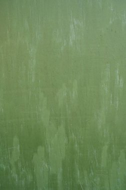 Yeşil metal arka plan. Boya döküldü. Metal desen arka plan olarak kullanılabilir.