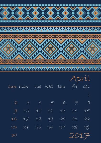 2017 Calendar planner with ethnic cross-stitch ornament on dark blue background Week starts on Sunday