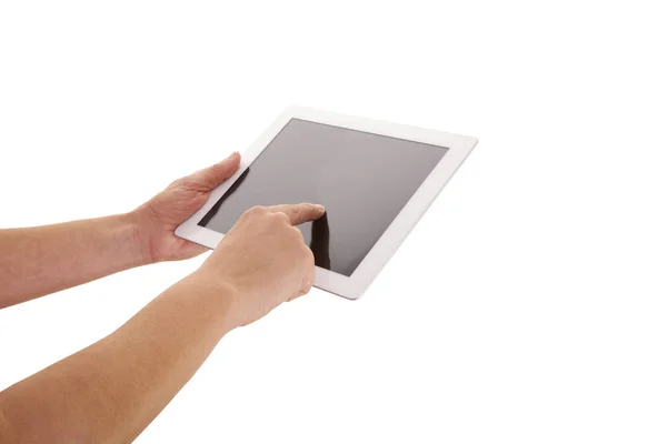 Vrouwelijke handhoudtablet en touching screen geïsoleerd tegen — Stockfoto