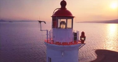 Hava panoramik eski Tokarevsky deniz feneri güneş doğarken kapatın. Vladivostok