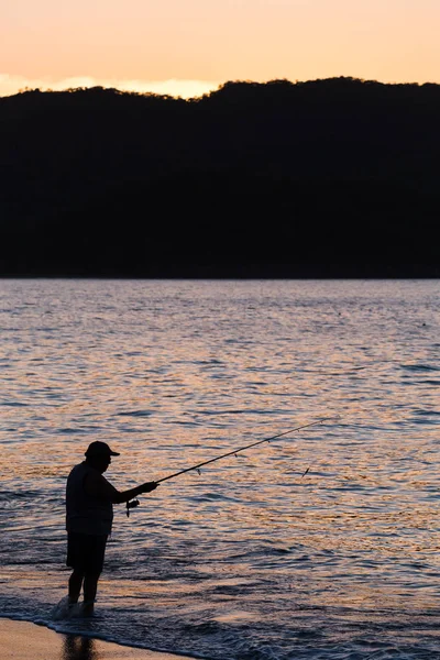 Sziluettje egy Tico halászat — Stock Fotó