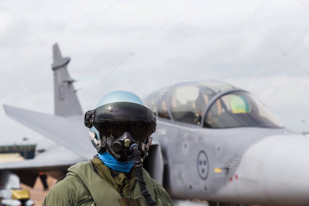 Swedish Grippen captured behind a dummy pilot in flying gear
