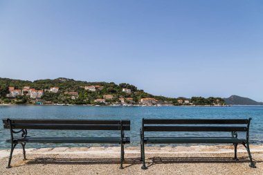 Benches look out over Kolocep bay clipart