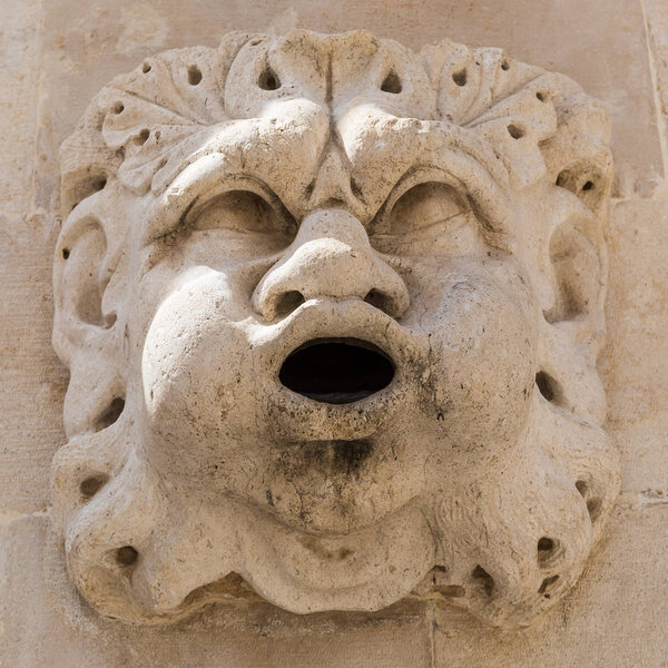 Close-up of a face sculpture
