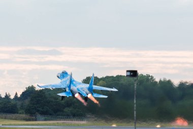 Ukrainian Air Force Su-27 Flanker roars into the sky clipart