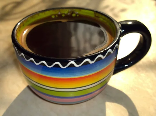 Zwarte koffie in een kopje — Stockfoto