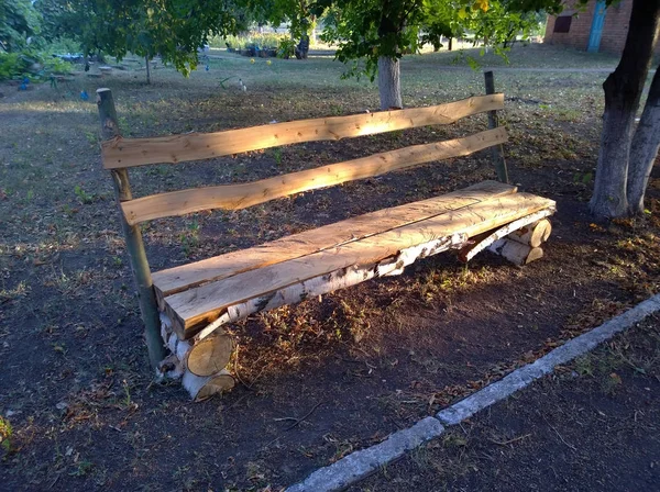 Wooden homemade bench — Stock Photo, Image