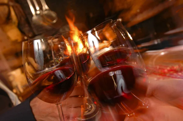 Four friends cheering, Drinking wine in a restaurant