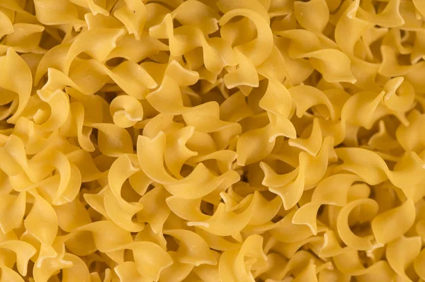 Sfondo pieno di pasta secca cruda — Foto Stock