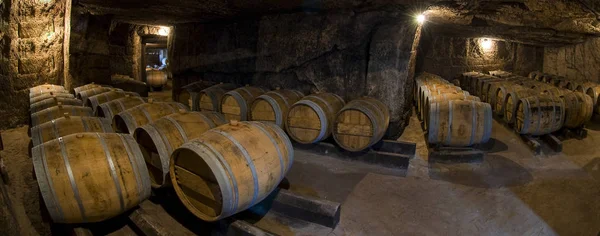 Barrels in old cellar, Bordeaux winery — Stock Photo, Image