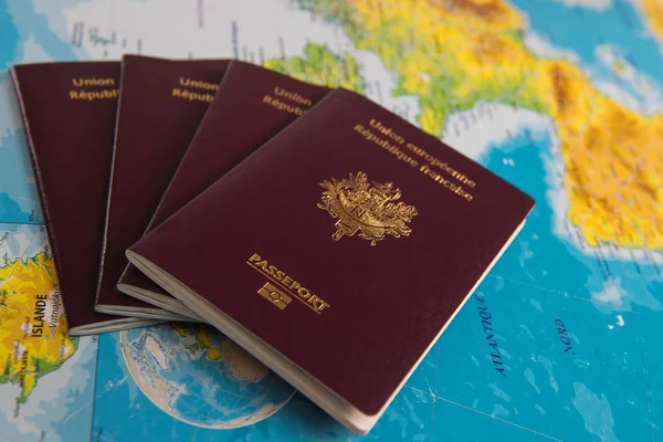 French passports on map and plane background — Stock Photo, Image