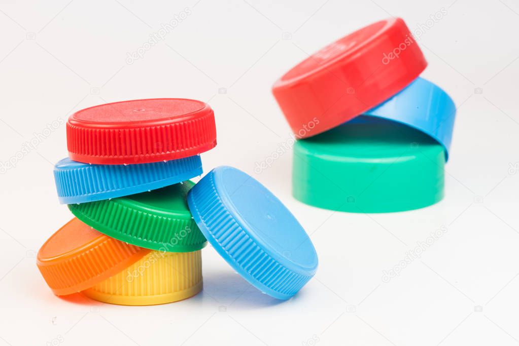 Plastic bottle screw caps isolated on white — Stock Photo © FreeProd